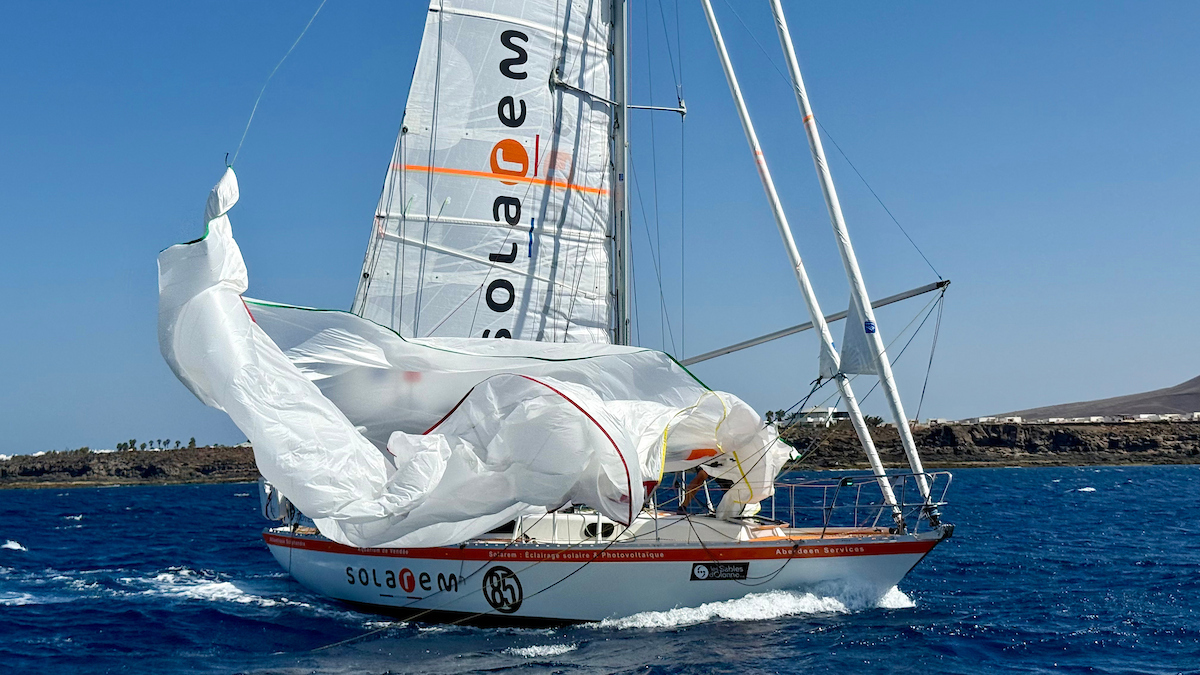 GGR 2026 French skipper Damien Guillou sailing his Rustler 36 SOLAREM past Marina Rubicón, Lanzarote, during the official film-drop passage on 16 September 2026.